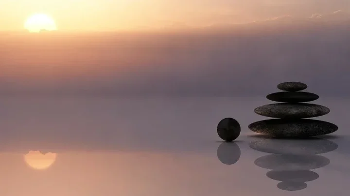 Emotional Balance, pebble stacked on water